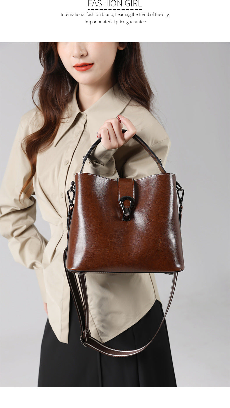Genuine leather crossbody bag, women's 2025 new women's bucket bag, fashionable versatile shoulder bag, commuting handbag
