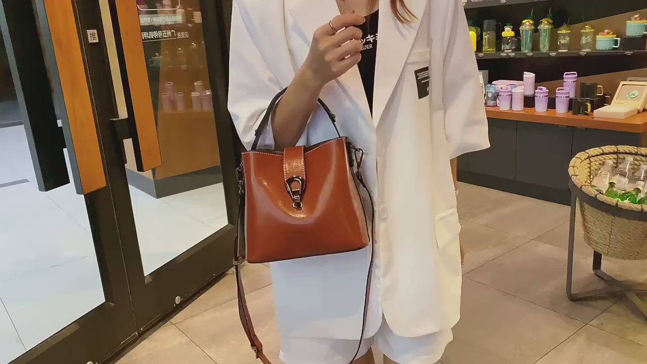 Genuine leather crossbody bag, women's 2025 new women's bucket bag, fashionable versatile shoulder bag, commuting handbag